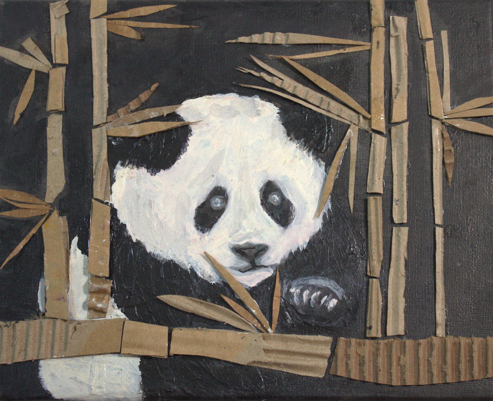 Panda painting with bamboo built from layered cardboard
